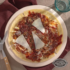 Pizza de pernil salat i formatge